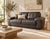 Handsome Chateau d’Ax two-seat leather sofa (fits 4 comfortably) with a rich charcoal gray finish, oversized pillow arms,...