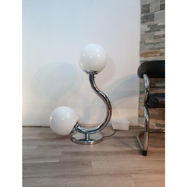 Exquisite and extremely rare Persepolis sculptural lamp by Fase. Spain, 1973. Curved chrome-plated metal structure...