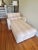Timeless art deco style piece designed by Jay Spectre. Its sculptural lines and comfortable quality seat will transition...
