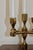 Made in Sweden. This exquisite five-arm candelabra, crafted from solid brass, is a design masterpiece produced by Gusum...