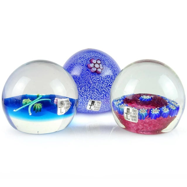 Beautiful vintage Murano hand blown flower designs Italian art glass paperweights. They are documented to the Fratelli...