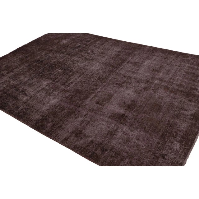 From rare collection of classic overdyed rugs, an 8×11 vintage Persian rug hand-knotted in wool circa 1970-1980. On the...