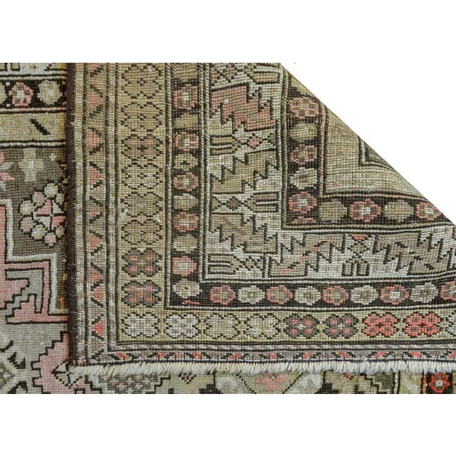 An extraordinary early 20th century Azerbaijani Shirvan rug three large stylized flower medallions amidst a field of more...