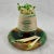 A Wedgwood Majolica earthenware pottery match holder and striker, Staffordshire, England – circa 1869. For the hearth,...