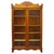An antique two-door bookcase attributed to R.J. Horner, crafted from carved oak and dating to approximately 1920. This...