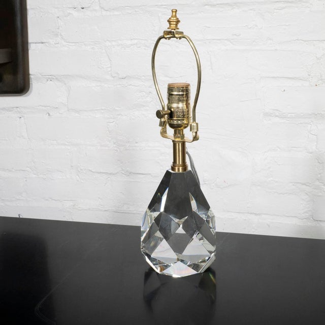 Faceted crystal fragment table lamp with brass hardware.