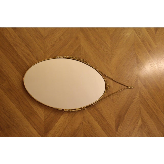 Mid-Century Modern Oval Brass Wall Mirror with Neoclassical Decoration and Brass Chain, 1950s For Sale - Image 3 of 17