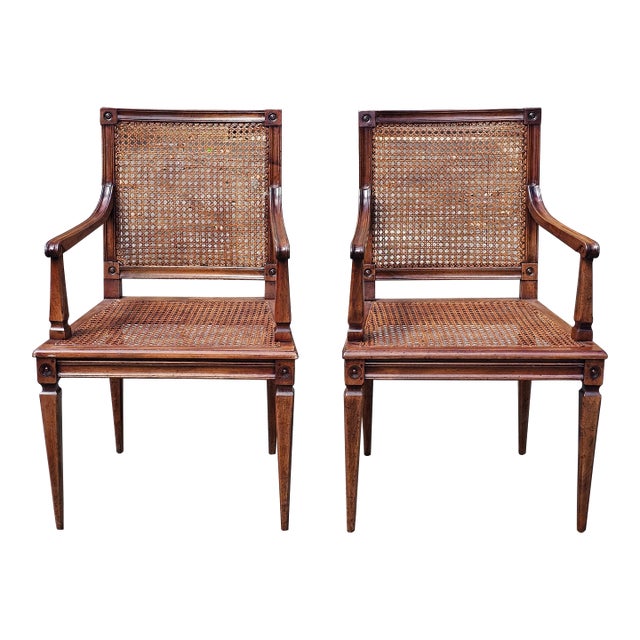 Mid 20th Century Pair of Neoclassical Style Caned Seat and Back Patinated Walnut Arm Chairs For Sale