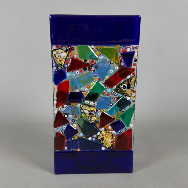 An exceptional and unique designer vase, a masterpiece of late-20th-century Murano glassmaking. Ideal for enhancing...