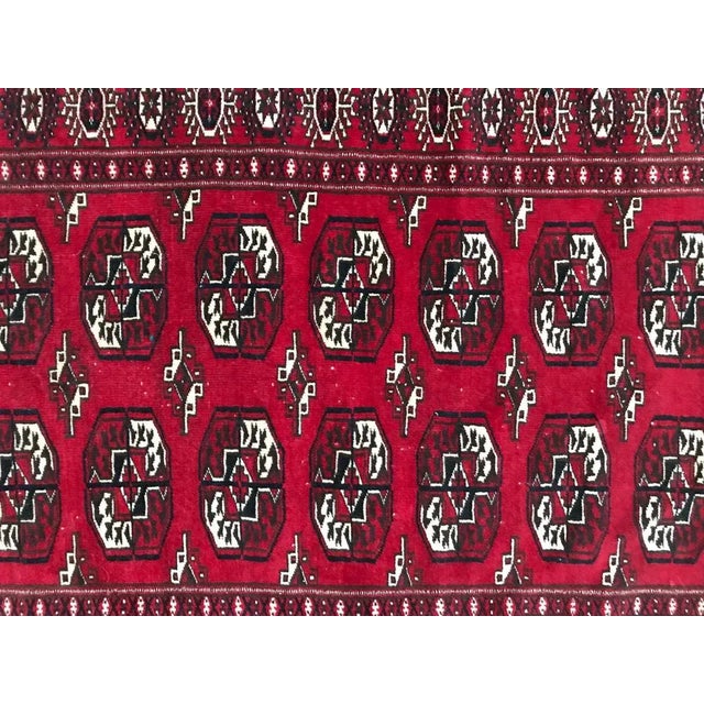 Beautiful 20th century Turkmen rug from Afghanistan, with nice geometric and tribal Bokhara design and red and black...