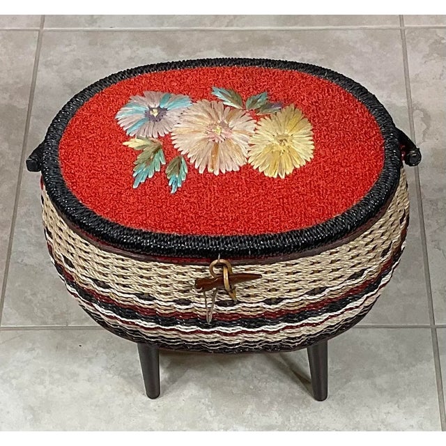 Lovely sewing kit made of hand painted rattan, the top is decorated artistically with floral raffia work. Inside include...
