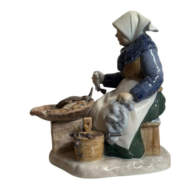 Ceramic figurine, B&G Denmark, fishmonger, 20th century Hand-decorated ceramic figurine, B&G mark on the bottom, numbered,...