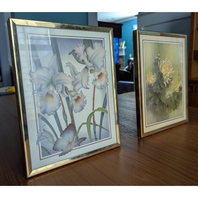 A lovely, complementary pair of vintage late-1970s to early-1980s contemporary floral art lithograph prints. This...