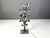 Fantastic Brutalist floor lamp made out of a sculpted flower shaped steel base with blue and clear glass murano glass...