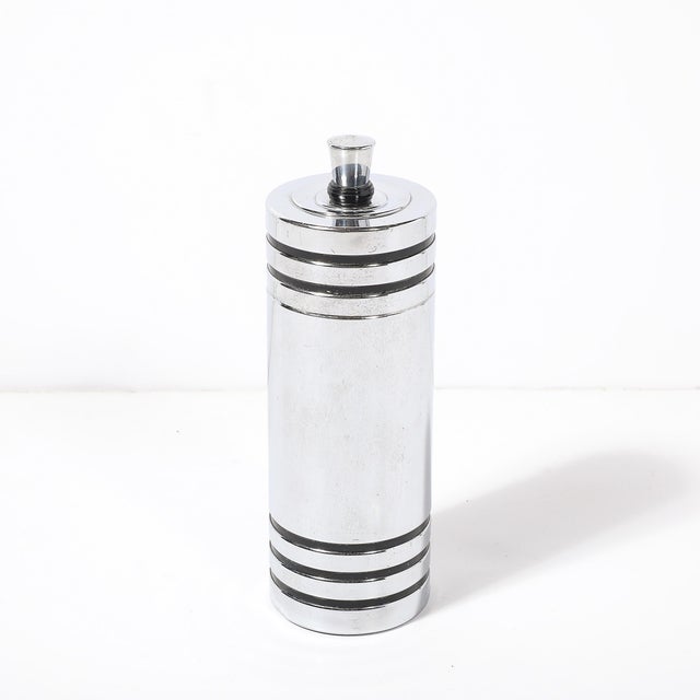 This exceptional Art Deco "Gaiety" cocktail shaker, designed by Howard F. Reichenbach for Chase circa 1935, is a striking...