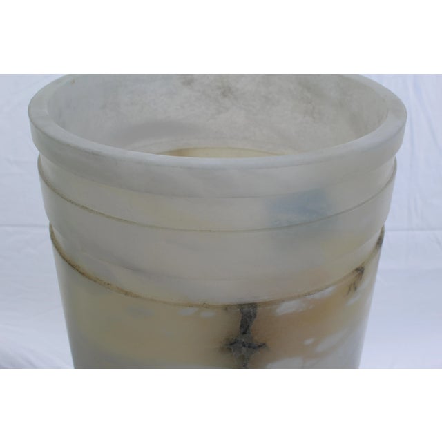 A Large up-lamp made of Alabaster Shade made in Spain, Lost wax Bronze cast base with polished and Vintage Silver patina....