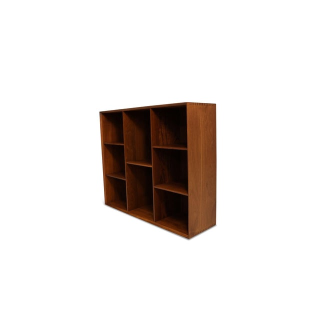 Danish Modern bookcase hutch designed by Peter Hvidt for Søborg Møbelfabrik, Denmark, circa 1952–56. Finely crafted of...