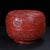 This is a substantial and exquisitely crafted carved lacquer box, featuring deep, intricate relief work in a rich,...
