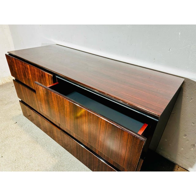1970s Rosewood Dresser - 6 Drawers - Restored. Gorgeous vintage dresser from the 1970s, made entirely of rosewood with a...