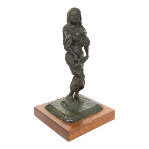 A Judaica Patinated Bronze Figure of Lady Pointing on Holy Book