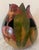 This sculptured art gourd is by Arizona artists Steve and Mary Schneck. Any way it’s turned shows stunning fuchsia and...