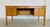 An exceptional Danish Modern desk designed and manufactured by Domino Møbler during the 1960s. Crafted from beautiful oak,...