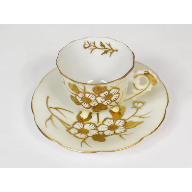 This is just the prettiest little demitasse cup and saucer Created by Kalk Porcelain in Germany. This set has the maker's...