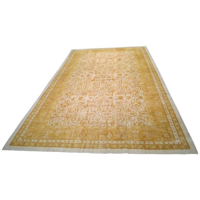 Hand-knotted with care using traditional rug-making techniques, this wool rug blends timeless craftsmanship with a modern...