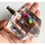 This charming lucite dreidel features a faceted clear body with a colorful, prismatic design to the hebrew characters,...