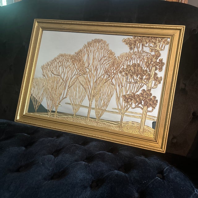 Gorgeous midcentury modern decorative wall mirror; painted trees in gold makes this a piece of art as much as it is a wall...