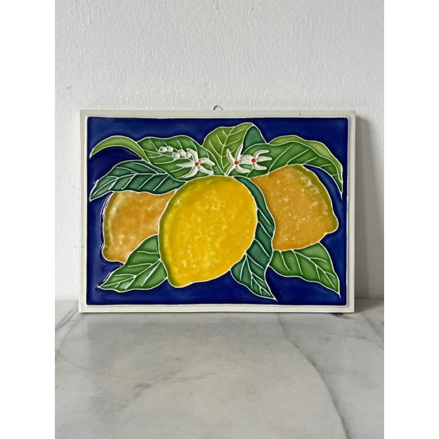 Vintage ceramic tile wall hanging of lemons. Made in Italy. Makers mark on back. Ready to hang. Minor age wear. No chips...