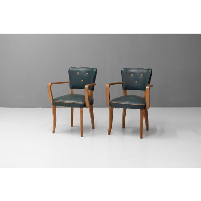 Pair of walnut framed bridge chairs with original upholstery. Circa 1950.