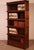 Elegant Globe Wernicke London oak bookcase from the late 19th/early 20th century, England, comprising five sections and a...
