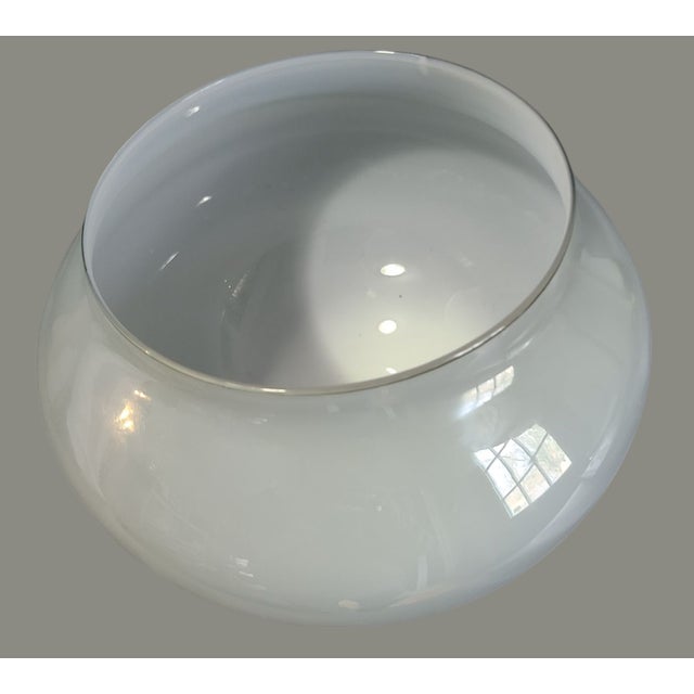 Elevate your home decor with this exquisite Vintage Venetian Hand Blown Art Glass Vase. The skilled craftsmanship is...