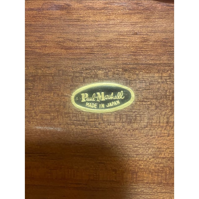 Charming mid-century modern fish-shaped serving tray by Paul Marshall, made in Japan. Crafted with a warm sculpted wood...