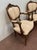 Pair of louis xv style armchairs medallion backs solid walnut frame cabriole legs with scrolled feet high-quality carving...