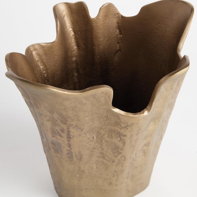 Made of a substantial cast aluminum, our Garin Decorative Vase is an organic, sculptural piece. Add an orchid or display...