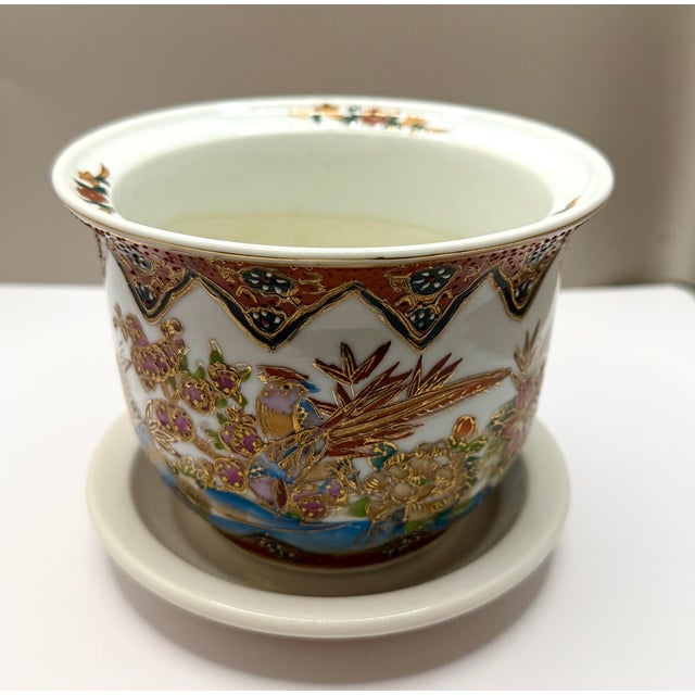 Hand-Painted Asian Porcelain Planter with Birds, Florals & Gold Accents A vibrant and intricately detailed porcelain...