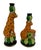 The CBK LTD Porcelain Jungle Cat Candlestick Holder is a unique and stylish decorative collectible piece featuring a...