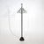 A “Servomanto” coat stand designed by Achille Castiglioni for Zanotta in the 1980s, characterised by a vertical black-...