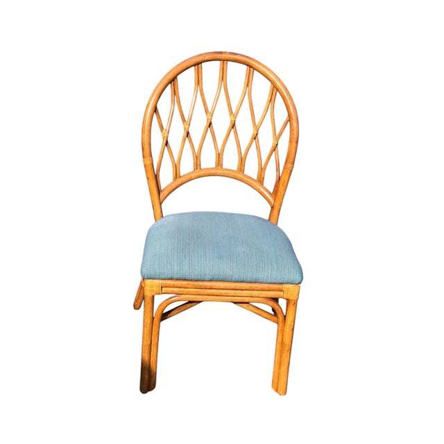 Vintage Rattan dining room set attributed to John McGuire consisting of glass topped rattan dining table and six dining...