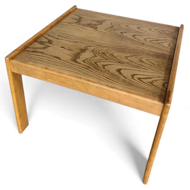This Danish coffee table combines mid-century modern style with practical design to enhance any living room. Crafted from...