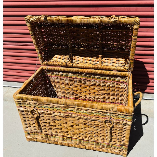 Vintage Large Rattan/Wicker Storage Trunk. Has side handles and front straps and handle. Dome style lid. Can be use for...