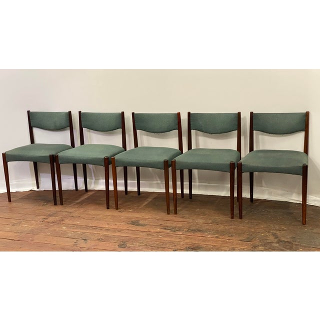 A fine set of five solid rosewood and upholstered dining chairs designed by Poul Volther for Frem Rojle, Denmark. Circa...