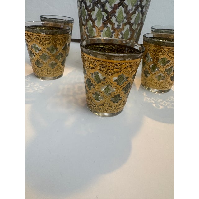 Culver Valencia Decanter and 5 Shot Glasses that were produced in 1962. Valencia has an intricate Moorish Design in Green...