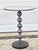 Lovely vintage side table. The base is studded metal in a bronze color. The top features an etched mirror. The mirror has...