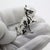 A detailed and expressive miniature, this vintage Italian German Shepherd figurine captures the strength and loyalty of...