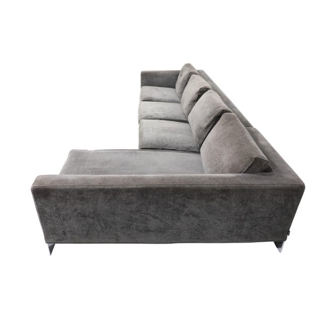 Beautiful sectional sofa by Minotti. In two sections with chrome plated feet. Can be used as is or ready for new...