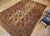 This authentic vintage Afghan Ersari room-size rug features a classic allover geometric composition woven in a highly...
