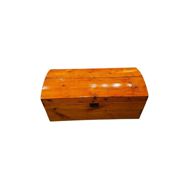 A charming antique light wood trunk dating to circa the 1870s, featuring a beautifully warm honey-toned finish, naturally...